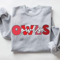 an owl's sweatshirt with the word owls printed on it