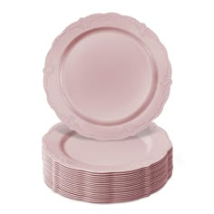 pink plates stacked on top of each other