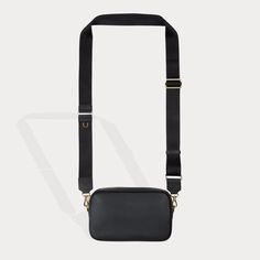 Crafted with a keen eye for detail, this bag showcases a sophisticated zipper top opening with rectangular silhouette, rounded corners and exterior molded slip pocket. The Miller is compatible with any and all Bandolier straps, so you can make your own statement with the strap of your choice. Modern Rectangular Box Bag For On-the-go, Rectangular Leather Bag Strap, Modern Rectangular Bag Strap For Everyday Use, Luxury Rectangular Camera Bag For Daily Use, Chic Removable Pouch Rectangular Bag Strap, Modern Black Bag Strap For Everyday, Modern Crossbody Shoulder Strap For Everyday Use, Rectangular Bag Strap With Removable Pouch For Daily Use, Versatile Rectangular Bag Strap For Everyday Use