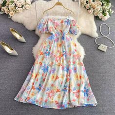 Seaside holiday beach dress, fashionable, off-shoulder printed waist A-line dressMaterial:blendedStyle:stylishColor:as pictureFeatures:printedSize:(cm):S,M,L,XL 1inch=2.54cm,1cm=0.39inchS:bust:80,waist:66,length:125&ltbr/>&ltp&gtM:bust:84,waist:70,length:126</p>&ltbr/>&ltp&gtL:bust:88,waist:74,length:127</p>&ltbr/>&ltp&gtXL:bust:90,waist:76,length:128</p>&ltbr/> Summer Off Shoulder Midi Dress, Flowy Off Shoulder Midi Dress For Summer, Spring Party Off Shoulder Dress, Multicolor Off-shoulder Dresses For Garden Party, Summer Off Shoulder Midi Dress For Day Out, Summer Midi Off Shoulder Dress For Day Out, Multicolor Off Shoulder Summer Party Dress, Off-shoulder Multicolor Dresses For Garden Party, Summer Beach Off Shoulder Dress With Floral Print