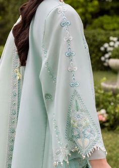 Brand: Sadaf Fawad KhanProduct Code: ZAPHIRA (B)Collection: Siraa by Sadaf Fawad Khan Vol-02 Unstitched Luxury Lawn CollectionFabric: Lawn Description: Zaphira - Sweet and charming like a fairytale princess. Tonal embroidery on soft summer base colors with a subtle texture play of gara and fine embroidery techniques. This look is enhanced with an organza karandi dupatta framed in chikankari inspired embroidery details. Don’t miss the delicate color contrast pops here and there. Details of Fabric Sadaf Fawad Khan, Shirt Layout, Misha Lakhani, Fawad Khan, Easy Dress Sewing Patterns, Embroidery Dresses, Desi Outfits, Dress Designing, Tonal Embroidery