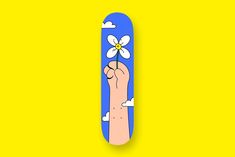 a hand holding a flower on top of a blue and yellow skateboard against a yellow background