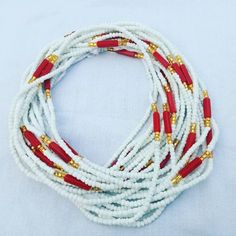 ♕ This Listing is for 20 - 100 Strands of WaistBeads ♕ Wholesale African waist beads. ♕ Ships directly from Ghana, West Africa. ♕ Free shipping via DHL (3 - 5 business days to arrive). ♕ Processing time (5 - 7 business days). ♕ Beads are all TIE-ON (made with cotton thread/polyester). ♕ Length varies from 45 to 50 inches. White Tiny Beads Waist Jewelry For Festival, Festival White Beaded Chain Waist Beads, Adjustable White Beaded Chain Waist Beads, Adjustable White Beaded Waist Beads, Adjustable White Waist Beads, Adjustable White Waist Beads With Gold Details, White Waist Beads With Gold Detail, Elegant White Beaded Waist Beads, White Faceted Beads Waist Beads For Gift