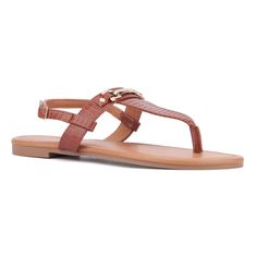 Enjoy a laid-back style with the Angelica sandal, featuring a traditional t-strap design with an ankle strap for minimalistic elegance. Perfect for sunny days, its comfortable fit and versatile styling make it ideal for leisurely outings. Whether paired with shorts, skirts or casual dresses, the Angelica sandal ensures you stay cool and stylish wherever your day takes you. Spring T-strap Sandals With Adjustable Toe Post, Spring Toe Post T-strap Sandals With Adjustable Strap, Flat T-strap Sandals With Buckle Closure, Adjustable Flat T-strap Sandals With Buckle Closure, Spring T-strap Flip Flops With Buckle Closure, Summer T-strap Toe Post Sandals With Adjustable Strap, Summer Adjustable Strappy T-strap Sandals, Summer Style Adjustable Strappy T-strap Sandals, Adjustable Strappy T-strap Sandals For Summer