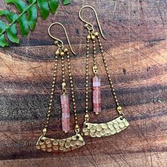 With a nudge to Egyptian style, this shape is stunning and swings gently with its central column of beautiful blush natural stones. Elegant Pink Earrings With Stones, Pink Brass Dangle Jewelry, Pink Brass Dangle Earrings, Blush Natural, Egyptian Style, Cherry Quartz, Gift Jewelry, Brass Earrings, Quartz Stone