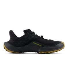 the north face men's hedgehog trail running shoe in black and yellow, side view