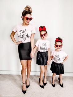 influencer wearing matching pink t shirts with daughters . girl friends vinyl design print in color black. picture perfect photo of mother and daughters wearing matching black leather skirts and black platforms to go with their girl friends t shirt. . Black Babydoll, Mommy And Me Dresses, Mommy And Me Shirt, Close Relationship, Mommy And Me Outfits, Matching Tees, Girl Friend, Matching Pajamas, Pink Blazer