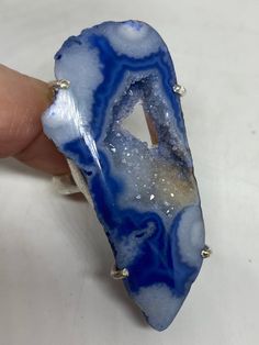 great color blue Lace agate stone The setting is handcrafted in low content silver About 2 inch long Size 6.5 Can be sized. My jeweler charges between $10-$15. All rings are shipped free in the US in a nice gift box. Check out our over a THOUSAND great reviews Engraving is $4 per letter and is not always perfect depending on the piece. It can take a few days if the jeweler is busy. This is payable to Paypal Judithsltd@gmail.com Handmade Blue Agate Rings, Blue Agate Geodes With Natural Stones, Blue Oval Agate Jewelry, Oval Blue Agate Jewelry, Blue Rings With Large Stone For Healing, Handmade Blue Geodes As Gifts, Handmade Blue Geodes For Gifts, Blue Agate Geodes, Handmade Blue Geodes For Gift