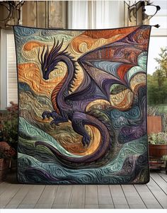 a quilt with an image of a dragon on it