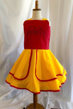 a dress that has been made to look like the princess from beauty and the beast