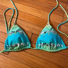 Green And Turquoise Sequined Bikini Top. Never Worn In Great Condition. Stored In Non Smoking Home. Green Triangle Halter Top For Beachwear, Green Beachwear Halter Top For Beach Party, Green Beachwear Halter Top For Beach Season, Green Halter Top For Beach Season, Green Halter Top For Beach Party, Green Triangle Halter Top For Vacation, Green Triangle Halter Top For Pool, Green Beachwear Halter Top For Poolside, Green Halter Top For Poolside Beachwear