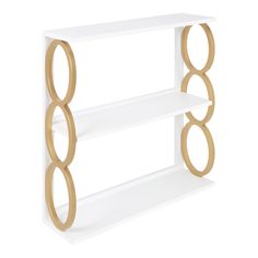 two white shelves with gold circles on the top and bottom, against a white background