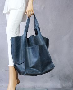 "Navy blue oversized handbag, Leather tote bag with pocket, Big Pocket Bag, Double Handle Weekender Bag , Carryall shopper bag soft leather This oversized bag has been carefully designed to be the perfect everyday bag. The size makes it practical for carrying everyday essentials. Made from 100 percent Italian leather. This bag is available in different colors, check in my store. These bags are so good and practical that you will use them every single day. This handbag is made of vegetable tanned Tote Bag With Pockets, Large Handbag, Soft Bag, Oversized Bag, Sac Week End, Big Pocket, Large Handbags, Leather Shops, Pocket Bag