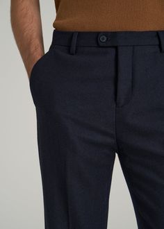 Tapered Wool Pants for the Guy with Style Elevated Slacks for Tall Men Step into comfort and class with our Wool Pants for Tall Men, specially sized for guys who stand above the rest. These full-length men's tall pants offer a tapered fit and a mid-rise, ensuring comfort without compromising on style. The pre-washed fabric minimizes shrinkage, while slash and double welt pockets provide ample storage for your essentials.• Tapered fit for a modern look• Mid-rise for comfortable wear• Slash and do Guy With Style, Scrubs Dress, Cozy Sleepwear, Tall Men, Tall Pants, Fall Denim, Mens Dress Pants, Sports Blazer, Long Sleeve Tee Shirts