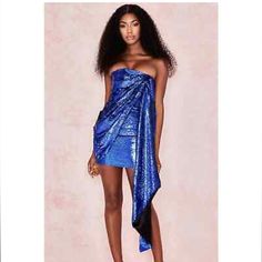 This Is A Gorgeous Cobalt Blue Mini Dress From House Of Cb. It Has A Zippered Side Closure. Blue Sequins. It Is A Stretchy Material. Material Makeup And Measurements From Website. Dress Length: Approx 64cm Roughly 25 Inches. Materials: Sequin (100% Polyester) Lining (100% Polyester) Lining (85% Polyester, 15% Elastane) Lining (72% Acetic Acid, 28% Polyester) Specialist Dry Clean Only Cobalt Blue Mini Dress, Sequined Fabric, Flexible Stretches, Crystal Sandals, Strapless Gown, Plus Size Shopping, Strapless Mini Dress, Plus Dresses, Bandage Dress