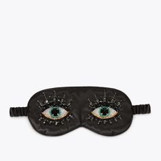 This Sleep Eye Mask features a black satin exterior with two crystal eye motifs.Hand wash onlyMaterial: 97% polyester, 3% spandexStyle number: 1310400609 Black Eye Mask, Sleeping Mask, Sleeping Eye Mask, Eye Masks Silk, Luxury Eye Mask Sleep, Eye Mask Sleep, Beaded Shirt, Rainbow Scarf, Inside My Bag