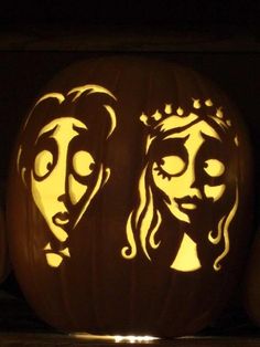 a carved pumpkin with the faces of two women on it, in front of other pumpkins