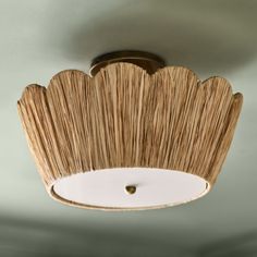 a close up of a light fixture in a room