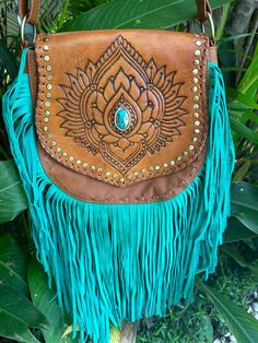 gorgeous genuine leather bag  28 cm x 28 cm   actual bag size  adjustable shoulder strap  fully lined with an inside pocket  back pocket  i honestly get so many compliments on this bag  wholesale deals available , message for details   happy shopping Turquoise Tote Shoulder Bag With Adjustable Strap, Blue Shoulder Bag With Tassels For Everyday Use, Bohemian Crossbody Satchel With Fringe, Bohemian Fringe Crossbody Satchel, Bohemian Turquoise Shoulder Bag, Turquoise Bohemian Shoulder Bag, Turquoise Leather Shoulder Bag, Turquoise Satchel Shoulder Bag, Turquoise Bags For Festivals