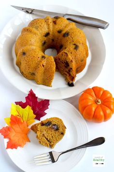 there is a bundt cake on the plate with two pieces taken out of it