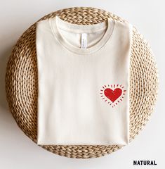 Hand Drawn Red Heart Tee - the perfect Minimal Women's Valentine's Day Shirt to wear all spring!   Youth sizes available for matching family mommy and me. Our shop uses direct-to-garment printing to make our products. The design ink is sprayed on, then allowed to soak into the fibers of the garment. This process yields fine quality prints and a smooth finish on the garment. BELLA + CANVAS T SHIRT The Bella + Canvas 3001 t-shirt feels soft and light, with just the right amount of stretch. It's comfortable and the unisex cut is flattering for both men and women. We can't compliment this shirt enough - it's one of our crowd favorites. And it's sure to be your next favorite too! SIZING Most customers feel this shirt fits true to size. This shirt is relaxed/loose fit and will be slightly longer Queen Of Hearts Tshirt, Queen Of Hearts Sweatshirt, Designer T Shirts Women, Heart T-shirt, Heart T Shirt Design, Print T Shirt Ideas, Queen Of Hearts Bachelorette Party, Queen Of Hearts Clothes, Cute Tshirt Designs Graphic Tees