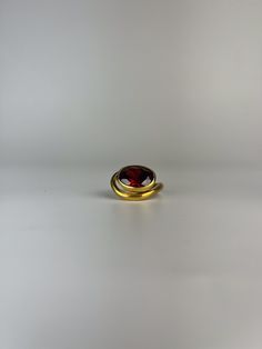 We present a gold colored Silver ring with a red stone! If you are not sure about your finger size, please contact us. You can be sure that all your questions will be answered with understanding and warmth.😊 Once you place the order, it will be adjusted according to your finger size and shipped within 1 business days, and a tracking number will be added as soon as possible.📦✈️ Our unconditional return policy and Customer-Friendly pricing are indicators of our self-confidence and respect for ou Red Garnet Oval Cabochon Ring, Gold Garnet Open Ring, Red Oval Ruby Rings, Red Oval Cabochon Ruby Ring For Gift, Red Oval Ring With Polished Finish, Gold Oval Ruby Birthstone Ring, Gold Ruby Open Ring Birthstone, Oval Red Gemstone Birthstone Ring, Gold Ruby Birthstone Open Ring