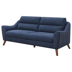 a blue couch sitting on top of a white floor next to a wooden leg chair