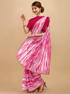 Pink and white sareeTie and dye dyed saree with embroidered borderThe saree comes with an unstitched blouse pieceThe blouse worn by the model might be for modelling purpose only. Check the image of the blouse piece to understand how the actual blouse piece looks like. Tie And Dye Saree, Tie And Dye, White Tie, Blouse Piece, Pink And White, Pink White, Saree, Dye, Pink