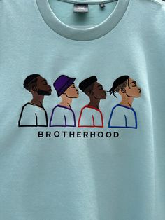 This versatile design promotes unity and strength among African American males.  The Dri-ease Tee is a blend of 100% cotton face and polyester backside which is soft, breathable and moisture wicking.  Slightly oversized.  Wrinkle Free. Clothing Ideas, Embroidered Design, Wrinkle Free, African American, Cotton Tee, Moisture Wicking, Gender Neutral, The 100, Great Gifts