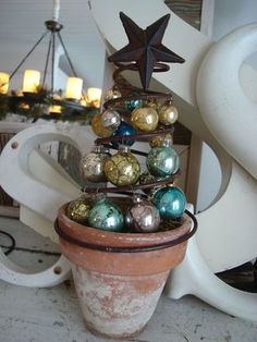 a potted plant with ornaments in it