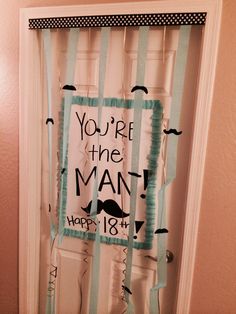 a door decorated with the words you're the man happy 18th