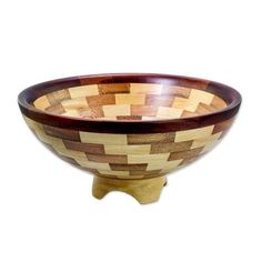 a wooden bowl sitting on top of a table