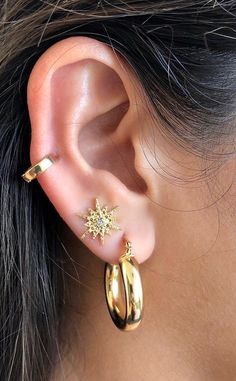 🌺Starburst Stud Earring | Gold Star Earring | North Star Stud Earring With Cubic Zirconia 18k Gold Filled Care Instructions: -We always recommend anything that is not solid gold to avoid liquids, perfumes and lotions. Don't worry our beautiful pieces will hold up to the elements of daily life, but remember they are NOT SOLID GOLD! -We want our products to work for you, not the other way around! To maintain that it is important to keep your jewelry clean! Without doing so, your pieces can become Elegant Gold Cartilage Earrings With Star Charm, Gold Plated Star-shaped Pierced Earrings, Silver Star-shaped Gold Plated Earrings, Gold Plated Star-shaped Single Earring, Gold Plated Star Shaped Single Earring, Star-shaped Yellow Gold Jewelry, Elegant Gold Star Cartilage Earrings, Elegant Gold Star-shaped Cartilage Earrings, Gold Starburst Celestial Earrings