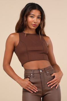 Effortlessly collect compliments everywhere you go in the Lulus Coveted Essence Dark Brown Mesh Cutout Tie-Back Crop Tank Top! Stretchy mesh knit shapes this flirty top with a crew neckline and a sleeveless, princess-seamed bodice. Perfectly cropped hem features sash ties that secure at the back below an alluring cutout and a surplice-style design. Fit: This garment fits true to size. Length: Size medium measures 16.25" from shoulder to hem. Bust: Great for any cup size. Waist: Fitted - stretchy Flirty Tops, Cutout Top, Crop Tank Top, Going Out Tops, Cup Size, Cropped Tank Top, Tie Backs, Stretchy Fabric, Crop Tank