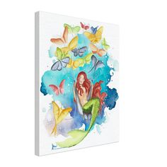 a watercolor painting of a mermaid sitting on a leaf with butterflies flying around her