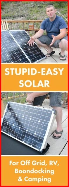 two men are setting up solar panels on the ground, and one man is pointing at them