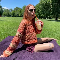 Airy but cozy sweater with a lacy flower pattern across the entire thing. An orange dreamsicle color way fit for a 70s queen.   Hand crocheted by yours truly. I feel like the coolest of cool girls when I wear this. Sized this as a medium but it's styled a little over sized for that size. Could comfortably fit S-L depending on desired fit. Chest is about 20 inches across so around 40 inches in diameter with about 20 inch sleeves for size reference.  I may be down to make custom size and color opt Trendy Cotton Crochet Top For Fall, Cotton Crochet Lace Sweater For Fall, Fall Cotton Sweater With Crochet Lace, Trendy Crochet Top With Knit Fabrication For Fall, Trendy Crochet Top For Fall, Bohemian Crochet Lace Sweater For Fall, Bohemian Crochet Lace Crew Neck Sweater, Fall Crochet Lace Crew Neck Sweater, Fall Bohemian Crochet Lace Sweater