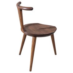 a wooden chair that is sitting up against a white background