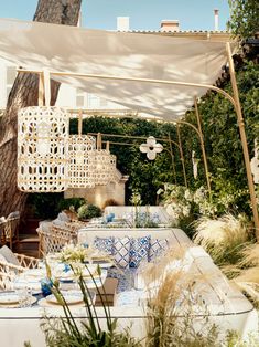 an outdoor area with white and blue decor