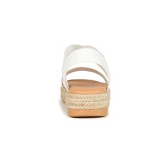 Enjoy the warm weather in the Caroline by Journee Collection. This strappy sandal features elastic uppers for a flexible fit and a 7 mm Comfort Foam™ footbed for added support. A walkable sliver wedge heel wrapped in espadrille perfects the design. Manmade upper,Easy pull-on entry,Approx. 1 1/2 inch heel,Open toe,Comfort Foam™ cushioned footbed for added comfort,Durable manmade outsole | Women's Journee Collection Caroline Espadrille Sandals in White Size 10 Medium Spring Synthetic Slingback Sandals With Textured Footbed, Summer Synthetic Footbed Sandals With Arch Support, Spring Flat Footbed Sandals With Arch Support, Spring Footbed Sandals With Arch Support And Wedge Heel, Summer Footbed Sandals With Arch Support And Ankle Strap, Adjustable Summer Footbed Sandals With Arch Support, Beach Slingback Synthetic Wedge Sandals, Adjustable Footbed Sandals With Arch Support For Summer, Summer Wedge Heel Sandals With Arch Support