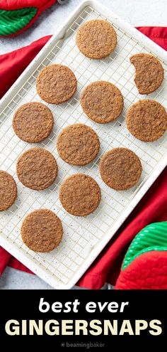 the best ever ginger snaps on a cooling rack with text overlay that reads, best ever ginger snaps