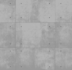 a concrete wall with several holes in the middle and one hole at the top that is missing