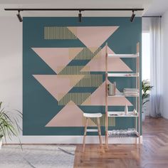 an abstract geometric wall mural in a living room