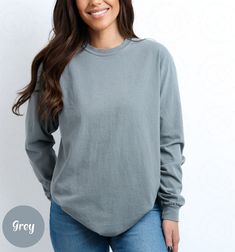 Blank Comfort Color Long Sleeve Shirt Long Sleeve Tee Wholesale Clothing Blank Shirt Long Sleeve Tshirt Women Long Sleeve Men Tee Long Shirt ✨ PRODUCT DESCRIPTION ✨ ∘ ∘ For an Oversized look, consider sizing up 1-2 above your normal size. ∘ ∘ UNISEX TSHIRT ∘ Relaxed fit ∘ Medium fabric ∘ 100% Preshrunk Cotton ∘ Garment-dyed fabric ∘ Double-needle topstitch seams for long-lasting ∘ ∘ Design colors may differ slightly from the final printed item due to the printing process and monitor calibration. ∘ ∘  📏 SIZE 📏 ∘ Adult Unisex sizing. We have a size chart on our listing photos ↑. ⏱️ SHIPPING & PRODUCTION TIME ⏱️ ∘ Please allow 1-5 business days for processing time. ∘ Shipping time is 3-5 business days. ✨ CARE INSTRUCTIONS ✨ ∘ Inside out, wash cold with a delicate cycle ∘ Hang Dry ∘ Do not u Gray Long Sleeve Casual T-shirt, Gray Relaxed Fit Long Sleeve Shirt, Casual Gray Long Sleeve Tops, Oversized Heather Grey Crew Neck Top, Heather Grey Cotton Top For Fall, Fall Heather Grey Cotton Top, Gray Relaxed Fit Long Sleeve Top, Soft-washed Long Sleeve Shirt With Relaxed Fit, Gray Long Sleeve Relaxed Fit Top