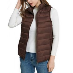 Jodie Womens Puffer Vest By Alpine Swiss Product Features: 100% Nylon Shell, 100% Polyester Fill & Lining STYLISH – The Jodie womens puffer vest is stylish and versatile. Wear it over T-shirts, long sleeve shirts, button downs, or sweaters for endless combinations of warm and fashionable ensembles. WARM – A down alternative filling makes this vest ultra-lightweight and comfortably warm while allowing your arms to have full range of motion. WATER RESISTANT – The nylon shell construction is durabl Trendy Nylon Spring Vest, Trendy Nylon Vest For Spring, Trendy Spring Nylon Vest, Trendy Nylon Vest For Fall, Casual Stretch Vest, Casual Nylon Vest For Fall, Casual Nylon Vest With Zipper Closure, Casual Spring Vest With Zipper Closure, Fall Nylon Vest With Zipper Closure