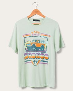 Bronco Rare Breed Vintage Tee | Junk Food Clothing Rugged Outdoor Relaxed Fit Top, Rugged Relaxed Fit Outdoor Top, Rugged Relaxed Fit Top For Outdoor, Vintage Adventure Graphic T-shirt, Retro Outdoor Graphic Print T-shirt, Vintage Graphic Print T-shirt For Adventure, Retro Graphic Print T-shirt For Outdoor, Retro Cotton Tops For Outdoor, Vintage Screen Print T-shirt For Outdoor Activities