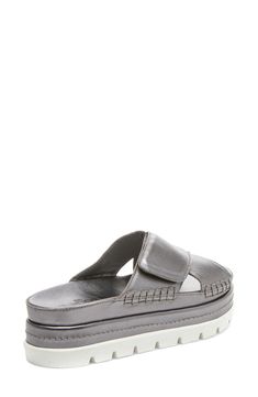 Lugs on the sole lend sporty style to a crisscross-strap sandal featuring dual-layer memory foam cushioning for all-day support. 2" platform Memory foam–cushioned footbed with arch support Leather upper and lining/rubber sole Imported Casual Silver Slides With Round Toe, Silver Sandals With Cushioned Footbed In Synthetic Material, Silver Sandals With Cushioned Footbed, Silver Synthetic Sandals With Cushioned Footbed, Silver Round Toe Wedge Sandals With Cushioned Footbed, Silver Slides With Cushioned Footbed And Round Toe, Silver Casual Slides With Cushioned Footbed, Casual Silver Slides With Cushioned Footbed, Silver Leather Slides With Cushioned Footbed