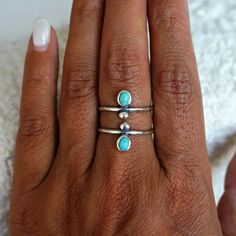 This fine sterling silver ring features the horseshoe design in genuine turquoise, symbolizes good luck and protection. Adjustable ring band allows you to wear it on any finger or stack with others. High quality sterling silver and genuine turquoise Adjustable Stackable Turquoise Midi Rings, Turquoise Stackable Toe Rings, Dainty Turquoise Stackable Ring, Silver Stackable Turquoise Ring With Open Shape, Silver Stackable Open Turquoise Ring, Stackable Silver Open Turquoise Ring, Stackable Open Silver Turquoise Ring, Blue Turquoise Stackable Open Ring, Dainty Adjustable Stackable Turquoise Ring