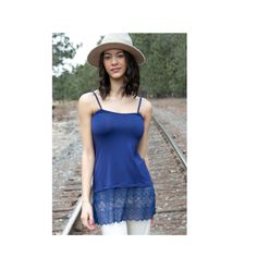 This Stappy Tank With A Lace Extension Is Great To Wear Alone Or With A Jacket Or Shorter Top. It Is Soft To The Touch With Adjustable Straps, Side Vents And Elastic Across The Pack For Added Comfort. Fabric: 97% Rayon, 3% Spandex Care Instructions: Machine Wash Cold, Hang Dry Chic Blue Camisole With Built-in Bra, Casual Lace Trim Camisole For Layering, Casual Camisole With Lace Trim For Layering, Spring Blue Camisole With Built-in Bra, Blue Camisole For Day Out, Blue Cami Camisole For Day Out, Blue Spring Camisole For Day Out, Blue Lace Trim Camisole For Summer, Blue Camisole With Built-in Bra For Spring