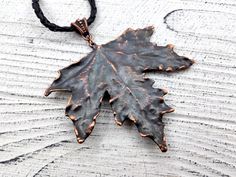 This natural leaf necklace is handcrafted with love and passion in my home studio. A beautiful pendant made from real maple leaf and little agate cabochon, covered with strong, pure copper layer. DETAILS: - This maple leaf pendant is already made and ready to ship - Black wooden box and jute bag included. Great gift package - Copper chain with clasp included. Choose your length in personalization menu - Free international shipping - Ships with tracking number within 1 business days once ordered! Handmade Bronze Leaf Jewelry, Handmade Brown Leaf-shaped Jewelry, Nature-inspired Leaf Shaped Copper Jewelry, Unique Handmade Leaf-shaped Necklace, Unique Handmade Leaf Necklace, Handmade Leaf Necklace, Maple Leaf Necklace, Citrine Crystal Necklace, Jewelry Nature